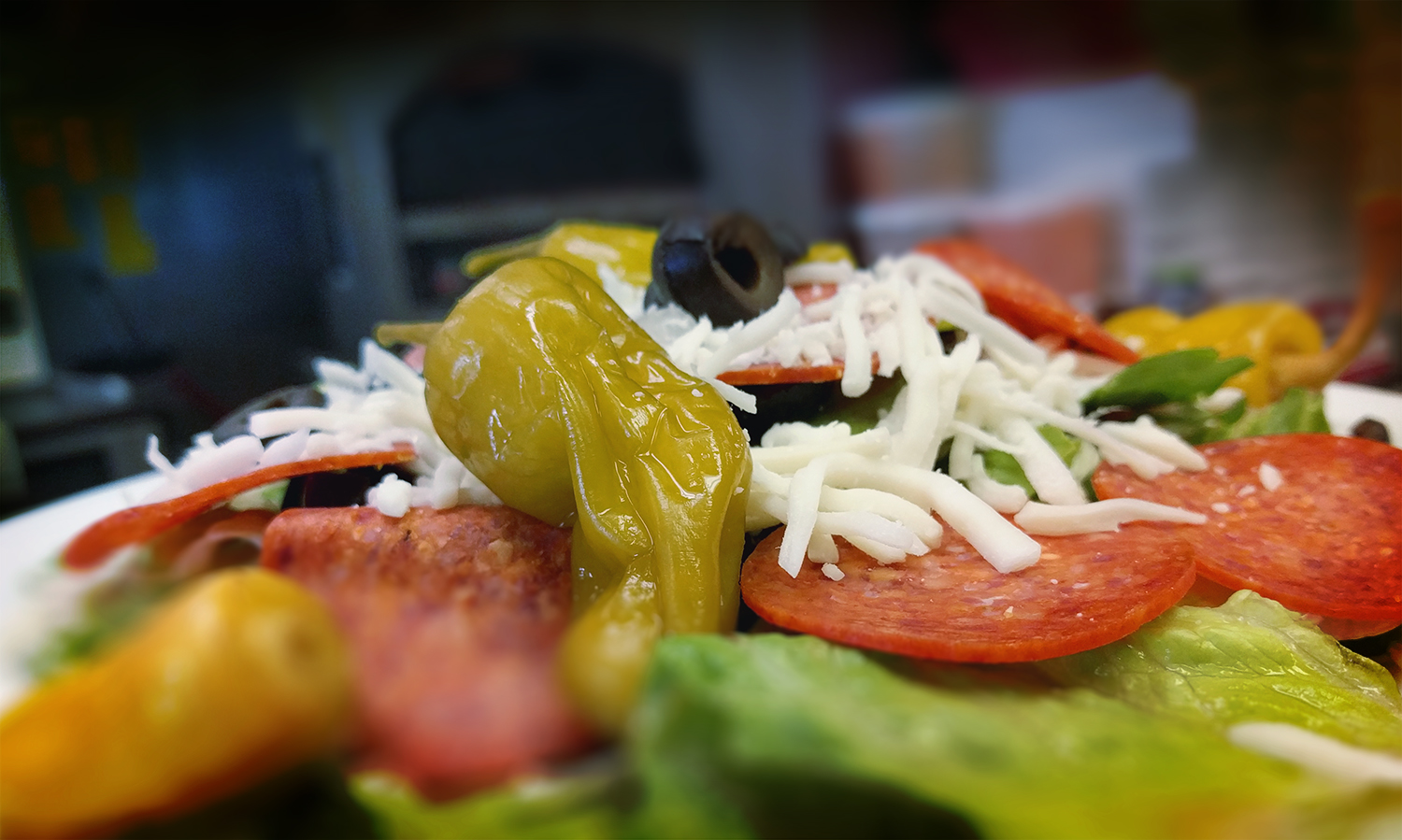 Antipasto salad with pepperoni, cheese and pepperoncini