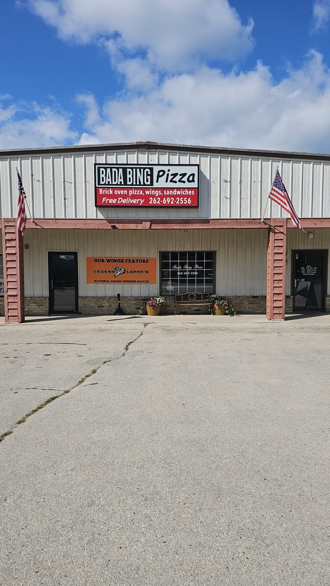 Straight-on view of the Bada Bing Pizza storefront in Fredonia